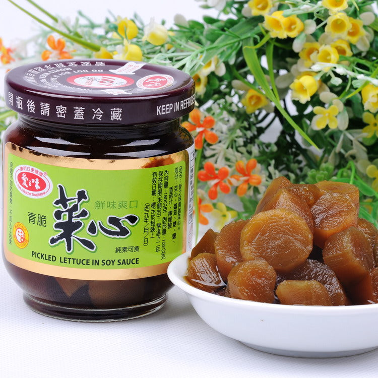 爱之味酱菜产品展示图，包含条瓜与菜心两种口味的瓶身包装。
