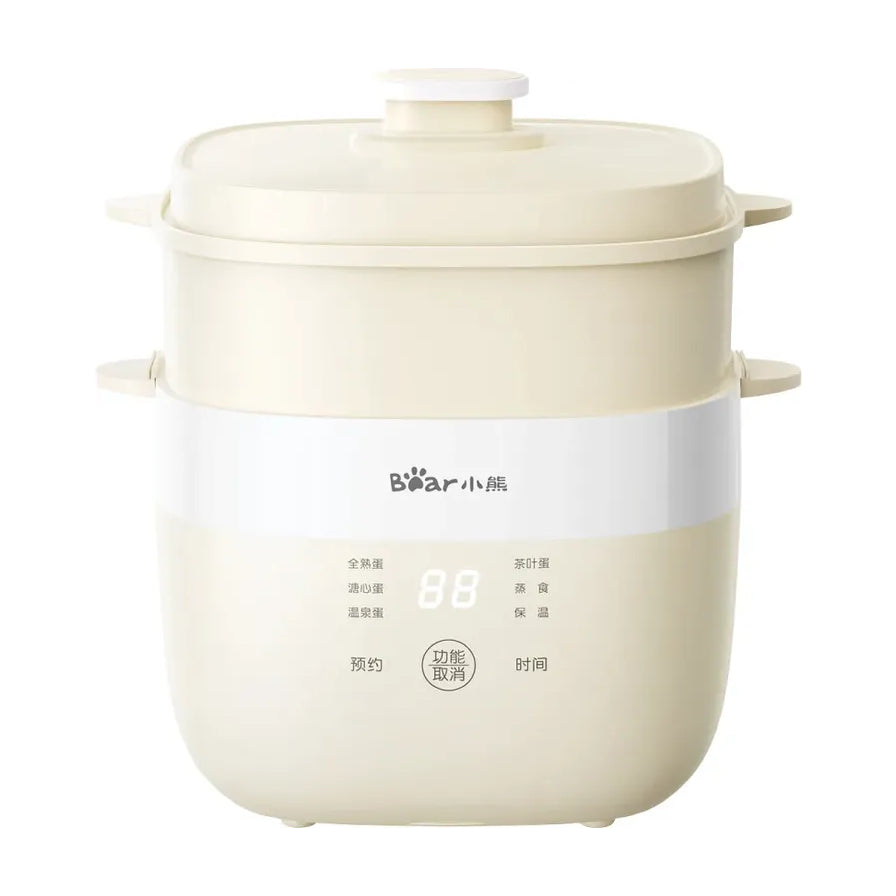小熊智能温泉煮蛋器 ZDQ - T10Y2 正面白底图，展示米白色机身、控制面板及双层结构。