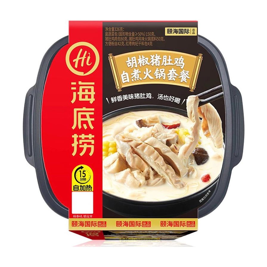 海底捞胡椒猪肚鸡自煮火锅套餐，红色包装盒正面特写，印有白汤猪肚鸡肉图片及“15分钟自加热”标识。
