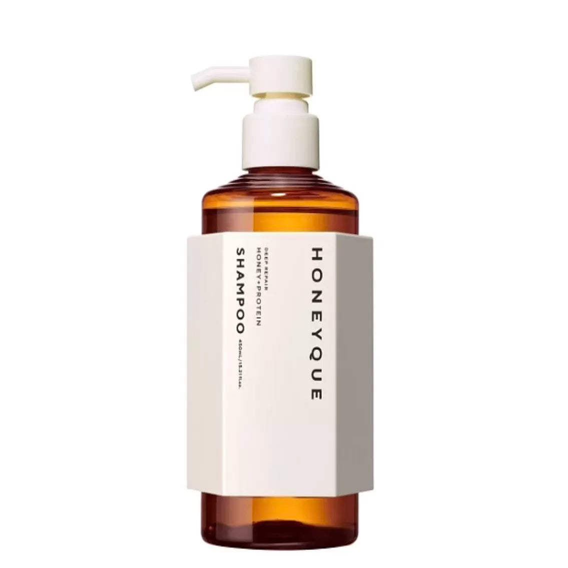 HONEYQUE 蜂蜜蛋白洗发水单瓶正面展示，琥珀色透明瓶身搭配白色泵头与极简标签设计。