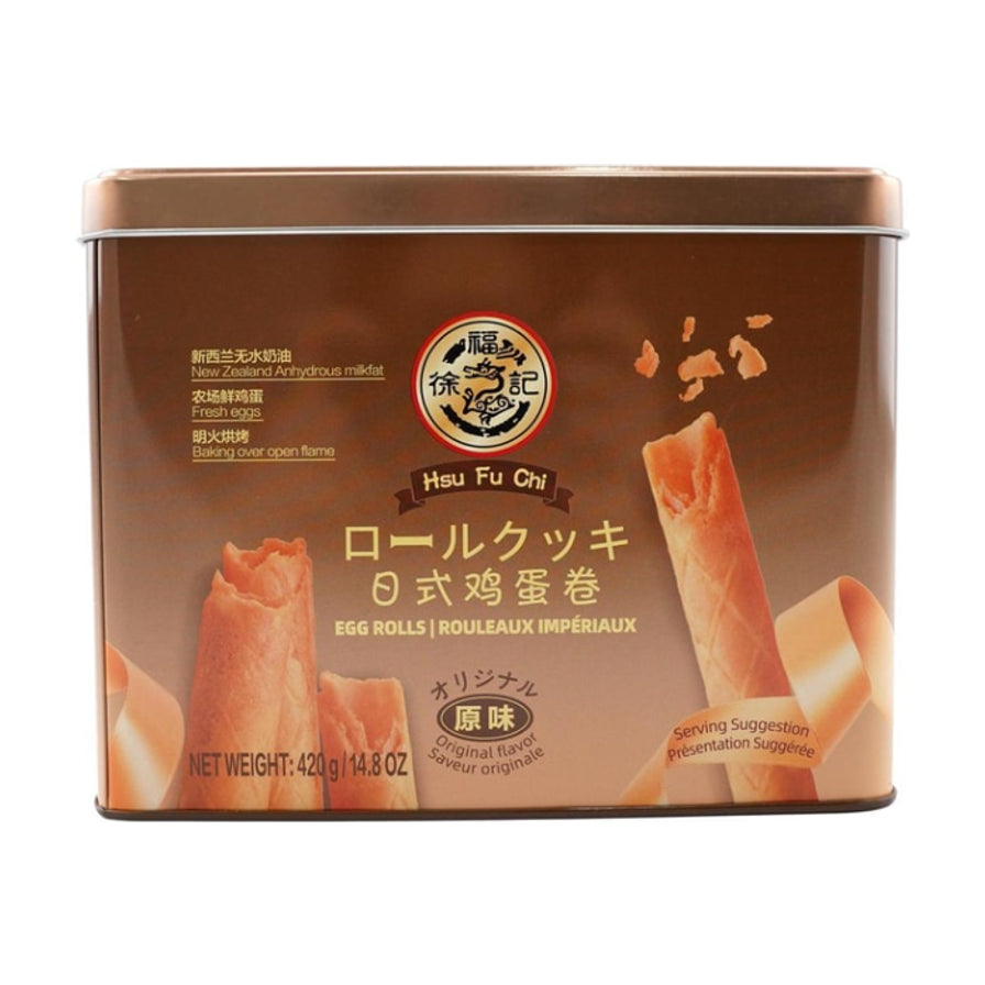 徐福记日式鸡蛋卷原味420克铁罐装，包装正面印有品牌Logo、鸡蛋卷实物图及新西兰无水奶油、农场鲜鸡蛋、明火烘烤等卖点说明。
