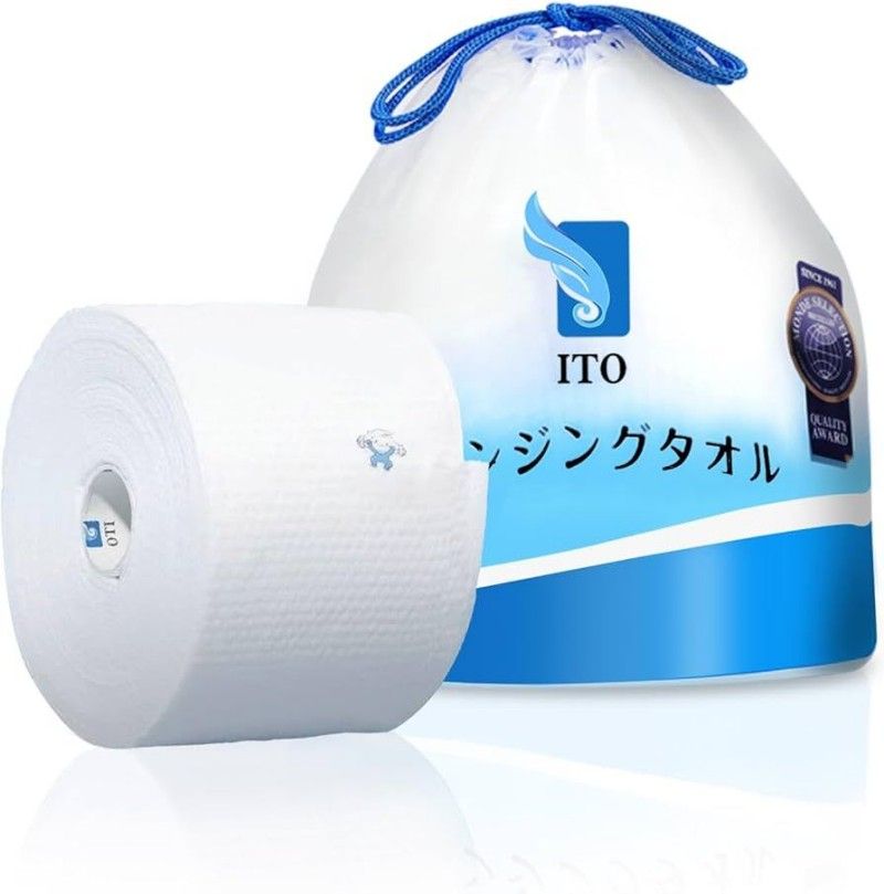 ITO 洗脸巾卷装产品与包装袋并排展示，呈现白色卷筒外观。