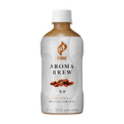 麒麟 Kirin 火焰直火焙煎咖啡，白色包装瓶装牛奶咖啡，瓶身印有 FIRE AROMA BREW 字样及咖啡豆图案。
