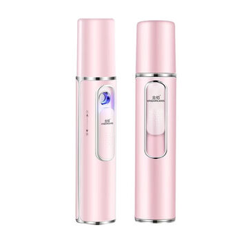 Kskin 冷热双喷蒸脸仪标准款正面与背面展示，粉色圆柱形机身，银色装饰环及喷雾口细节。