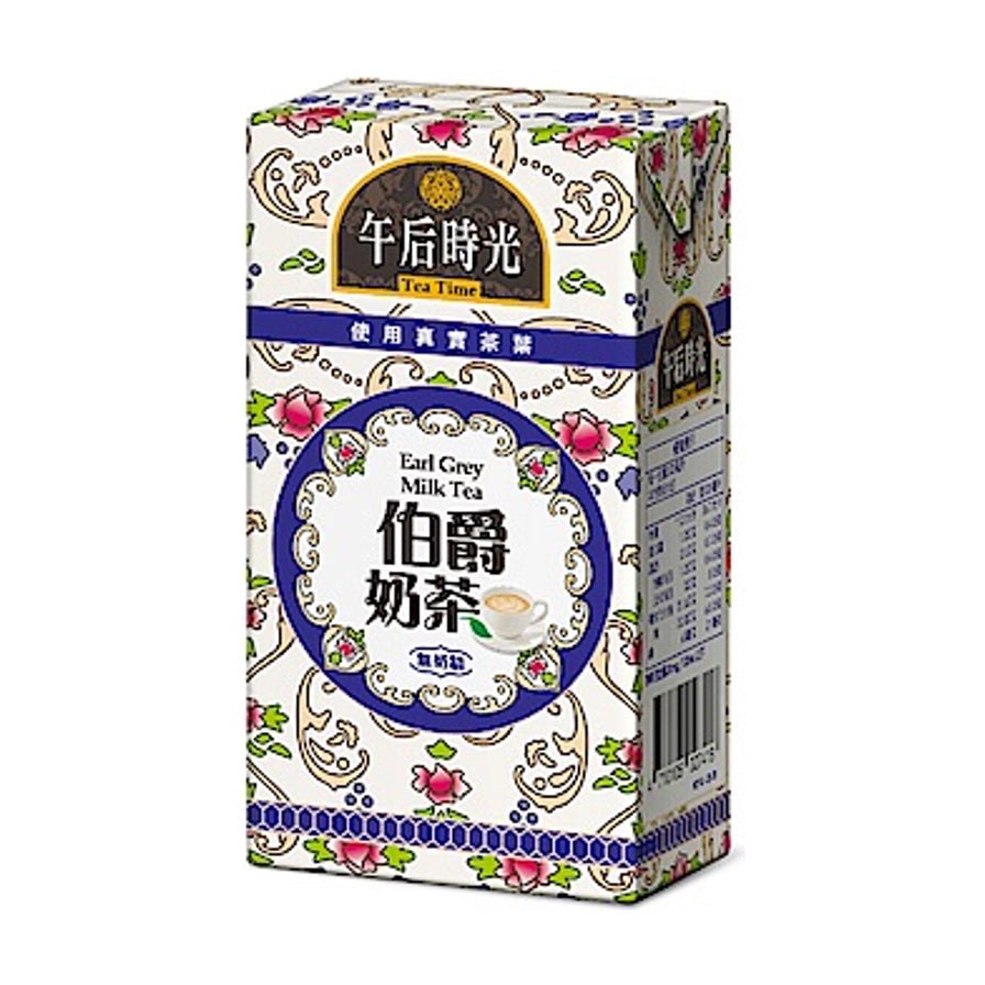 光泉午后时光伯爵奶茶利乐包装，白色背景带有英伦风碎花图案，正面印有伯爵奶茶和Earl Grey Milk Tea字样。
