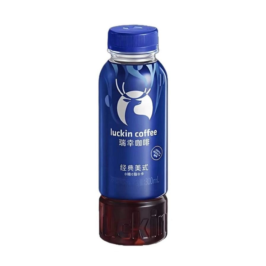 单瓶瑞幸经典美式瓶装咖啡，蓝色包装印有经典美式及0糖0脂0卡字样，底部显示深色咖啡液体。