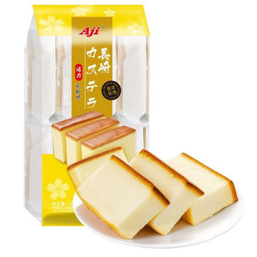 乳酸味长崎蛋糕独立包装特写，呈现微微湿润的 Q 弹表面