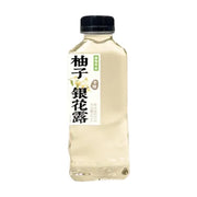 植物驾到柚子银花露500ml瓶装，白色标签印有黑色书法字体，透明瓶身展示淡黄色液体。