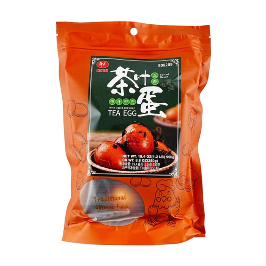 神丹带汁带壳茶叶蛋五香口味550克橙色包装袋，正面印有茶叶蛋实物图及五香标识。