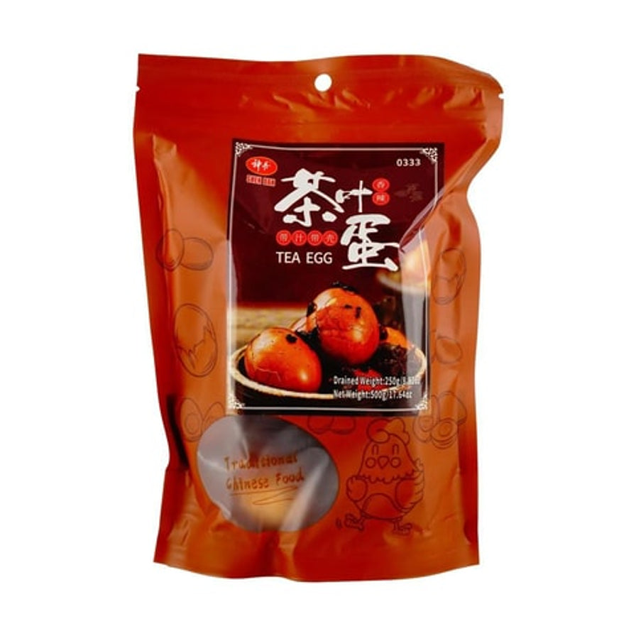 神丹带汁带壳茶叶蛋香辣口味包装袋，展示深红色调的香辣口味标识及产品实物图。