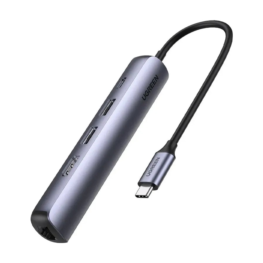 绿联五合一扩展坞产品特写，展示其修长的深灰色金属机身、侧边 USB 接口、尾部千兆网口及自带的 USB - C 连接线。