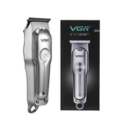 VGR V - 071 专业电动理发器，全金属机身设计，展示理发器实物及黑色包装盒。
