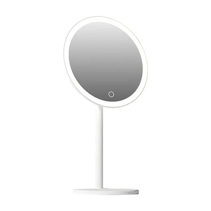 玉瓷白 LED 化妆镜正面展示，7 英寸圆形镜面搭配稳固底座，底部设有触控开关。