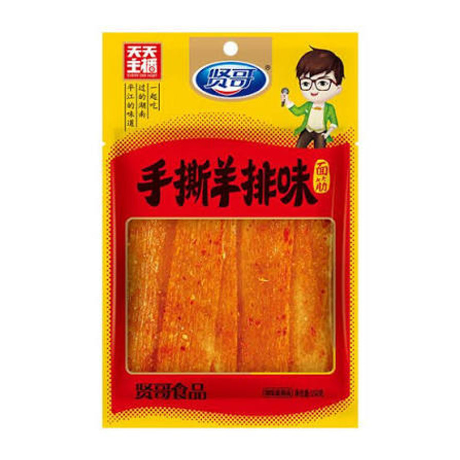 贤哥手撕羊排味面筋包装正面图，黄色背景带有卡通人物形象，透明窗口可见撒满辣椒粉的片状面筋。