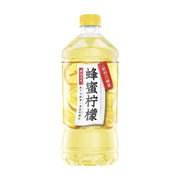 元气森林蜂蜜柠檬水900ml大容量瓶装，包装上有新鲜柠檬切片图案和新西兰蜂蜜标识。