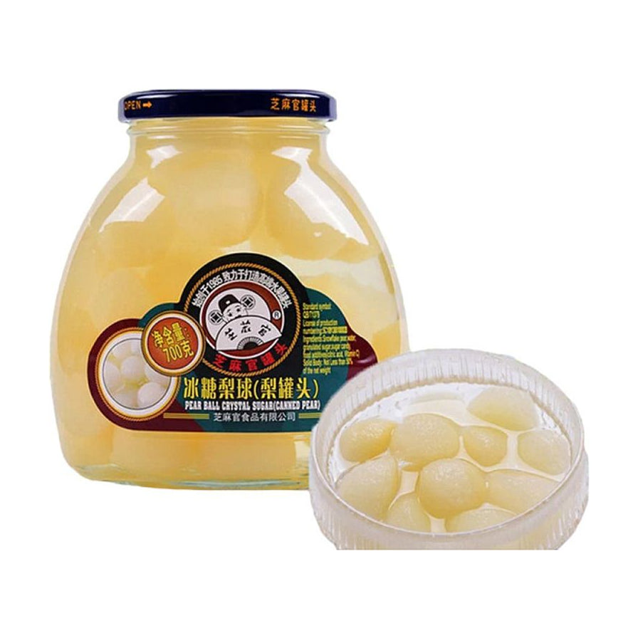 芝麻官冰糖梨球700g玻璃罐装，展示了透明罐身内饱满的梨球和一碗盛出的梨球。